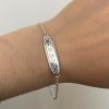 silver-blue-sapphire-bracelet Sapphire Flower Id Bracelet