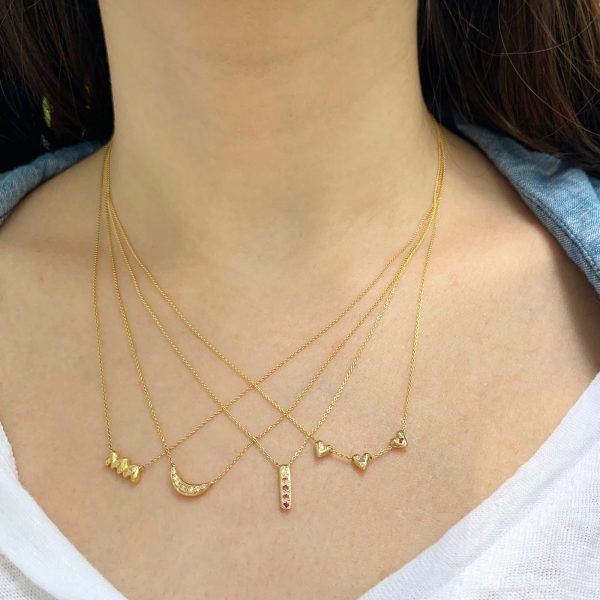 teeny-tiny-heart-necklace-and-skinny-bar-necklace wearing the teeny tiny heart necklace and skinny bar necklace