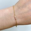 wearing-the-skinny-bar-bracelet-in-yellow-gold wearing the skinny bar bracelet in 14k yellow gold