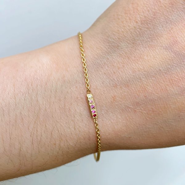 wearing-the-skinny-bar-bracelet-in-yellow-gold wearing the skinny bar bracelet in 14k yellow gold