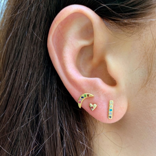 wearing-tiny-mini-skinny-bar-stud-earrings Wearing tiny mini stud earrings in yellow gold