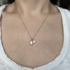 hamsa charm and 6 point star charm gold and diamond necklace