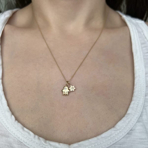 hamsa charm and 6 point star charm gold and diamond necklace