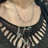 Facetune_17-06-2022-14-10-17 Diamond Treble Clef Charm