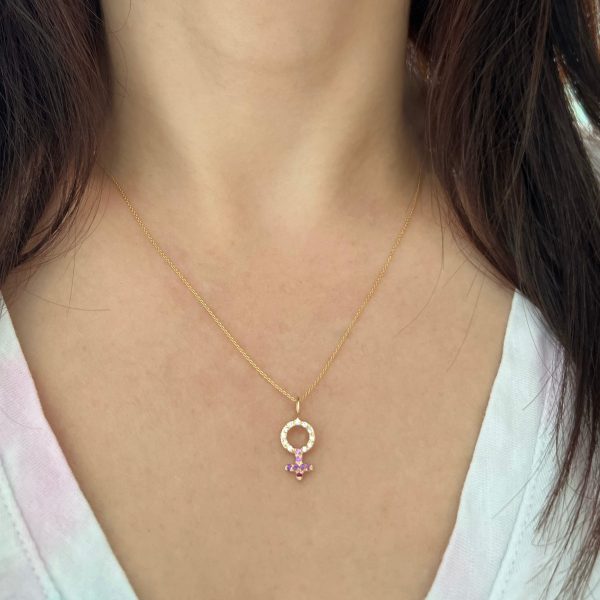 gold-diamond-gemstone-female-sign♀-charm-elisa-solomon-jewelry wearing the custom female charm necklace in 14k yellow gold with white dimaonds and pink gemstones