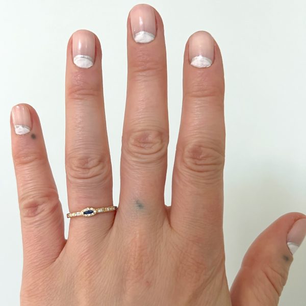 hand wearing the marquis band