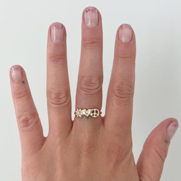 wearing the Peace Love and Flowers Ring