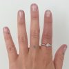 sun-moon-ring-gemstones wearing the gold moon and sun ring with gemsotnes