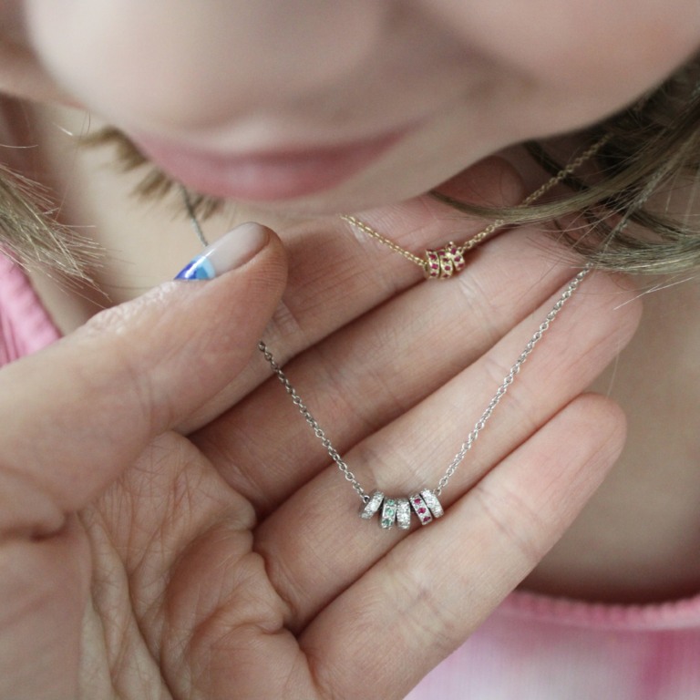 wearing the tiny beads necklace