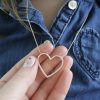 holding-the-large-open-heart-diamond-necklace Large Diamond Open Heart Necklace