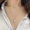 wearing-the-black-and-white-cookie-charm-gold Wearing the 14k Gold Black and White Cookie Charm with Diamonds