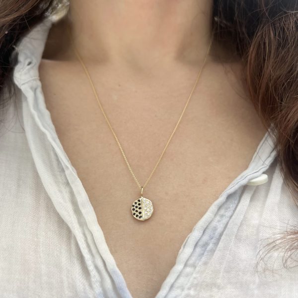 wearing-the-black-and-white-cookie-charm-gold Wearing the 14k Gold Black and White Cookie Charm with Diamonds