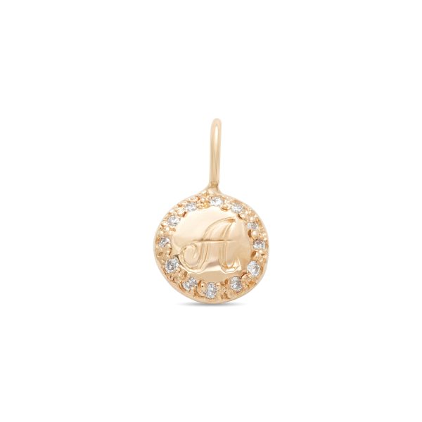 engraved-circle-charm-gold Letter engraved into the center of the gold circle charm with diamonds around it