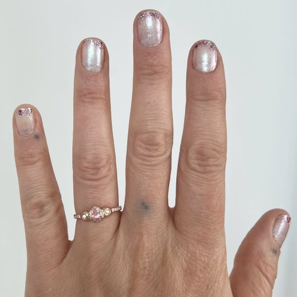 pink-sapphire-gold-diamond-pear-ring-wearing Pink Sapphire and Diamond Pear Ring