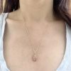 wearing the 14k gold apple charm