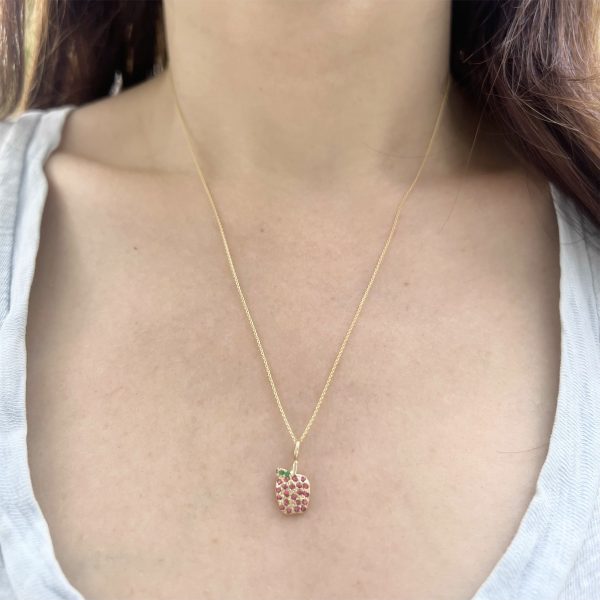 wearing the 14k gold apple charm