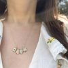 the gold birthstone flower charm collection