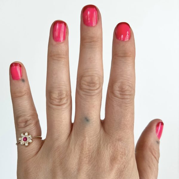 birthstone-flower-ring wearing the birthstone flower ring on a pinky