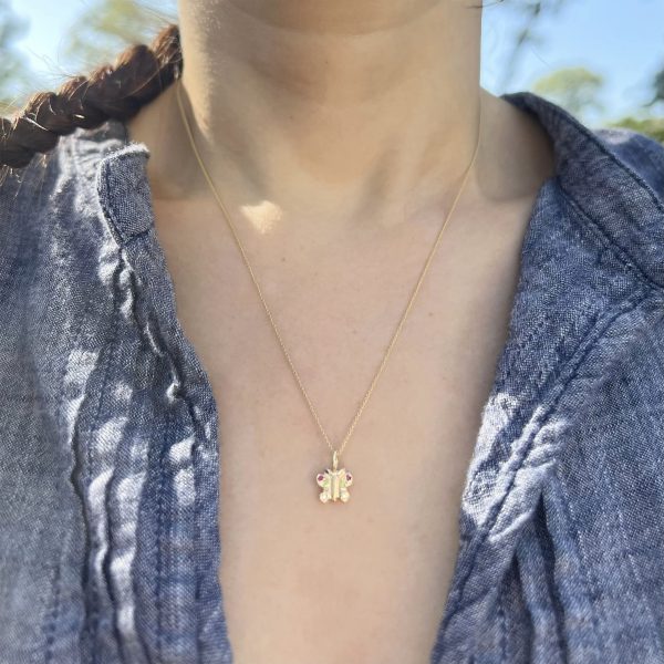 butterfly-charm wearing the 14k gold butterfly charm
