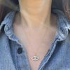 wearing the 14k yellow gold eye charm