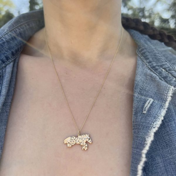 horse-charm wearing the 14k yellow gold horse charm necklace