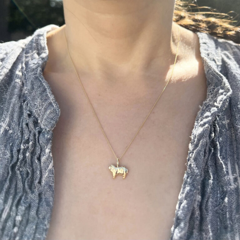 wearing the 14k gold sheep charm necklace