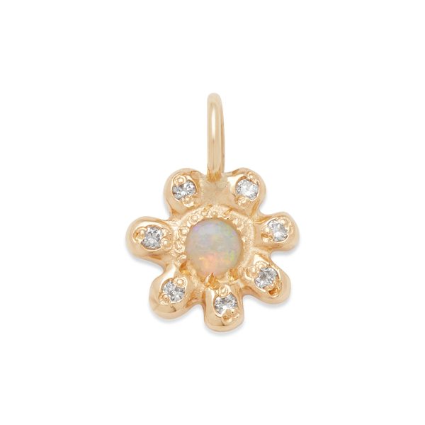 gold flower charm with opal center gemstone and diamond flower pedals
